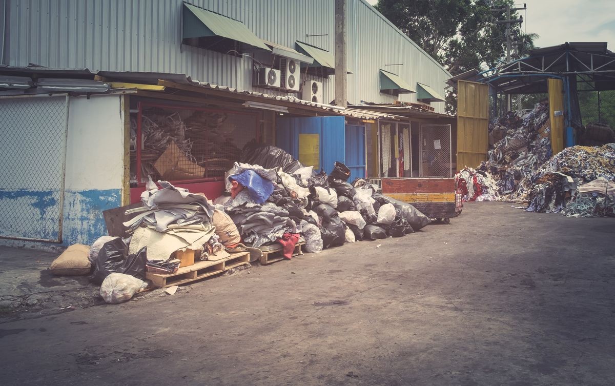 Garbage removal hazardous danger waste industrial. Pile of junk biohazard trash disposal.